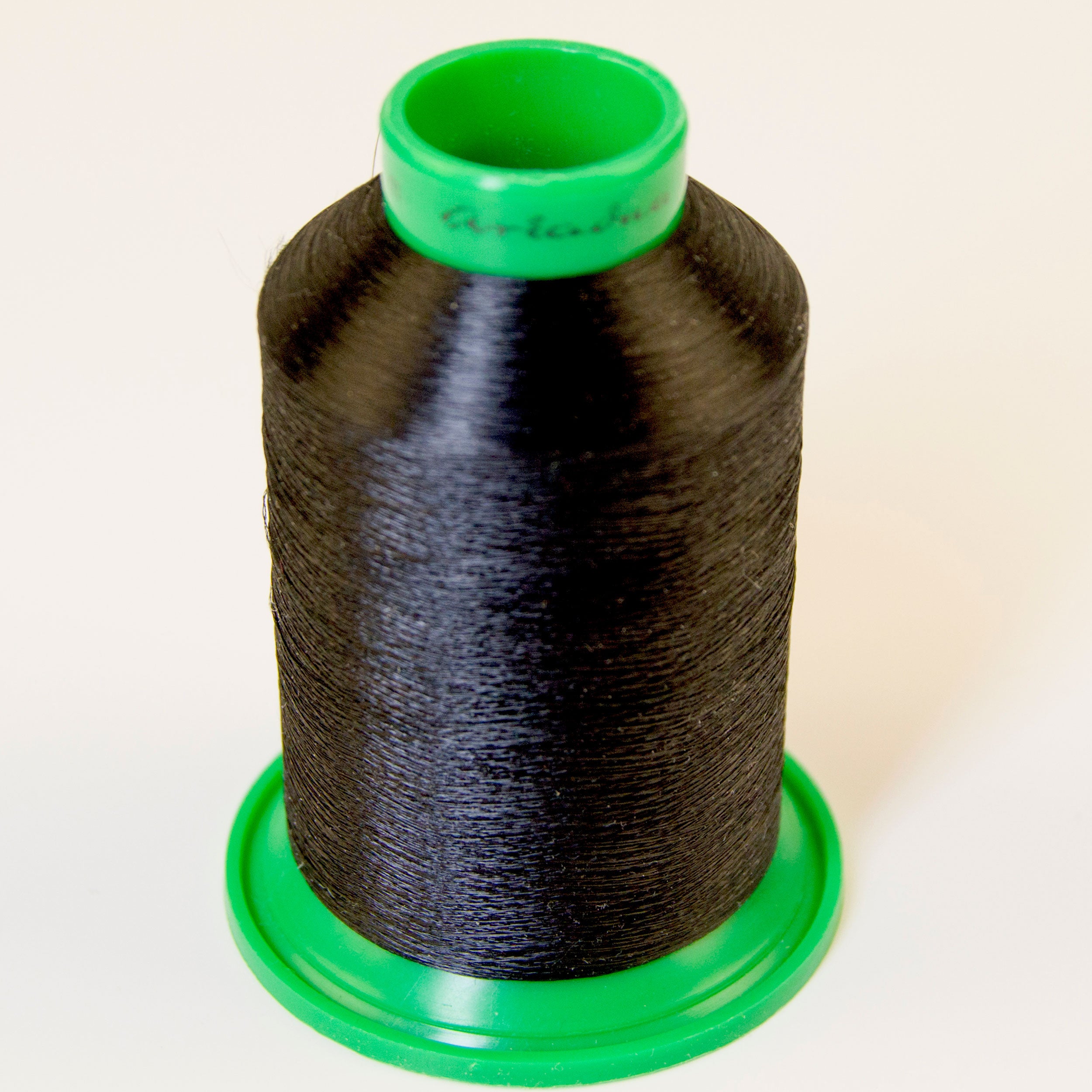 Hand-friendly black string art thread spool