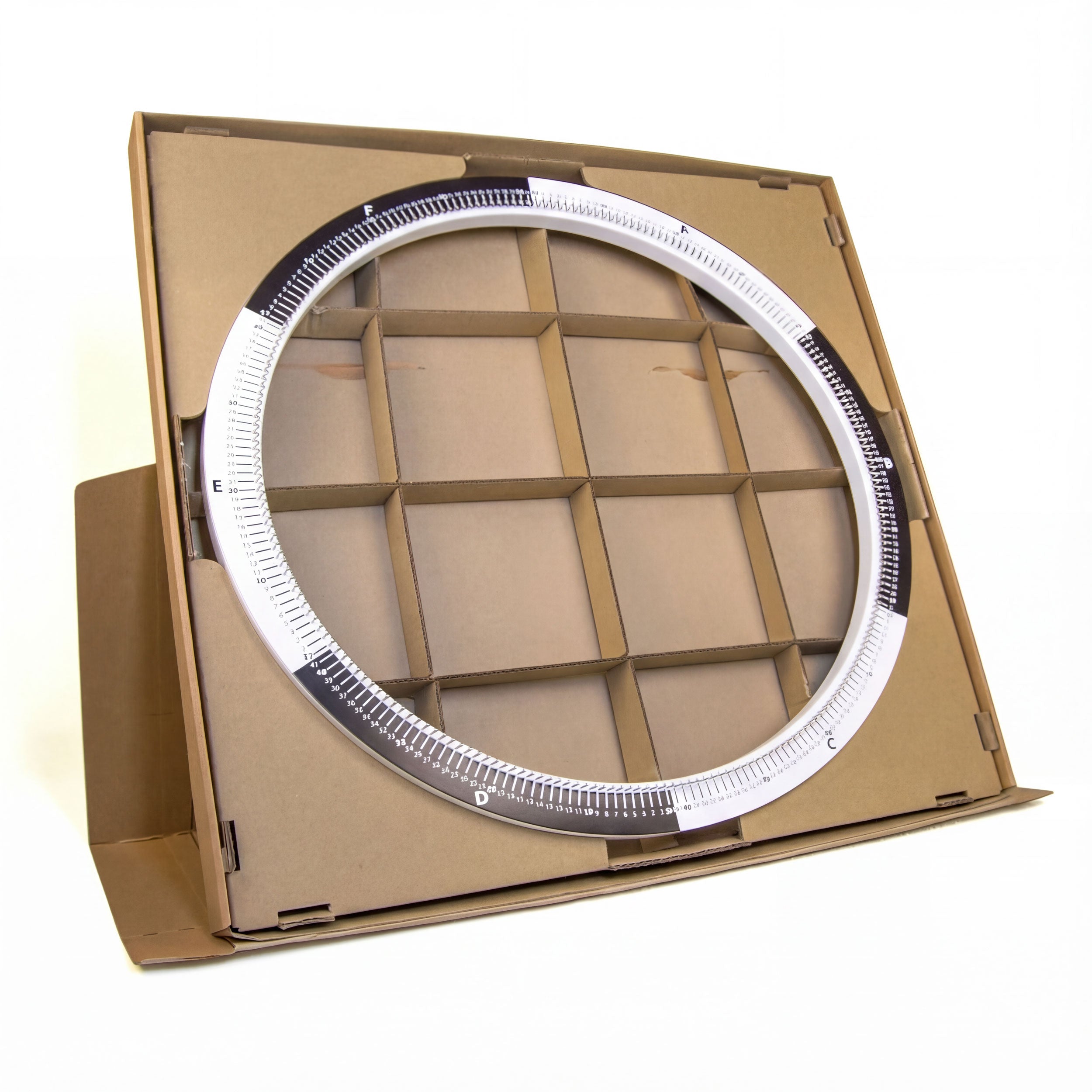 Open String Art DIY kit box showing the inner cardboard structure and circular frame area